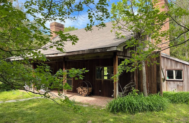 Outrange at Blue Heron Farm. Pet friendly cabin at waterfront farm!