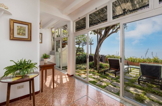 Overseas Glimpse - Patio overlooking the Sea
