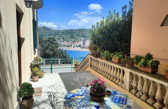 Panoramic apartment in villa on beach, in center