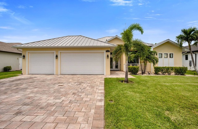 Paradise Villa awaits you on a Gulf access canal and private heated pool and spa