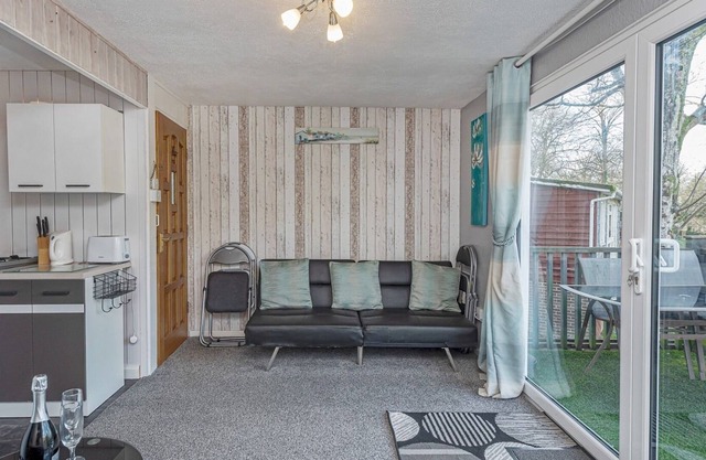 Pass the Keys | Cosy Chalet at Lakeside Glan Gwna Holiday Park