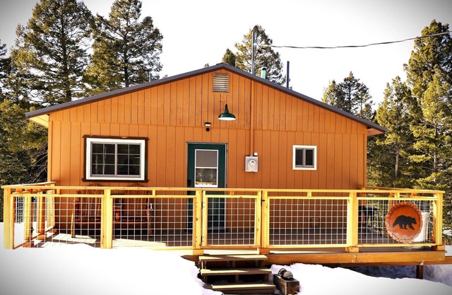 Paws in the Pines, quaint romantic cabin, world class fishing, dog friendly