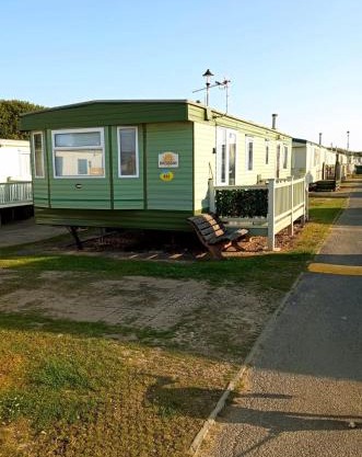 PD Wonderwall Caravan, Direct beach access & Beds made on arrival & GCH