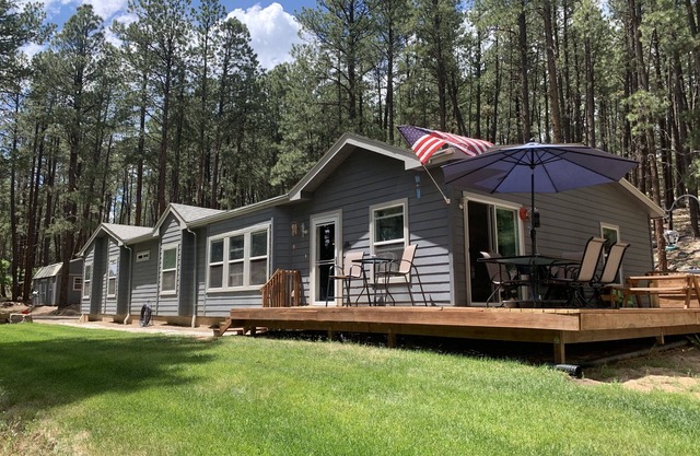 Peace and privacy await among the towering Pine Trees.