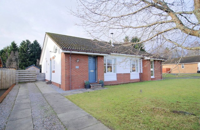 Pet friendly large four bedroom property with fire, sauna , enclosed garden with BBQ and views of th