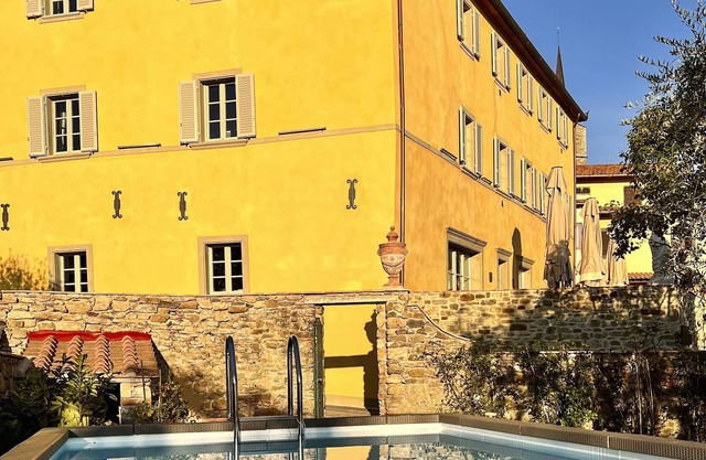 Piano Nobile in historic palazzo with garden and pool