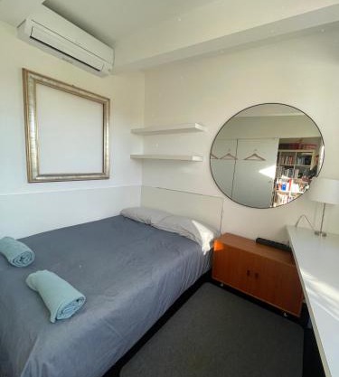 Piccola camera in appartamento condiviso con terrazza vista mare