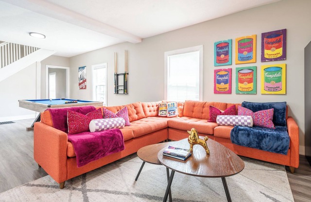 Play pool, shuffleboard, and more in this Pop Art inspired clubhouse!