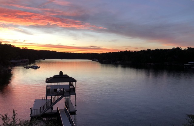Point lot w/beautiful views! Deep water, 2-story dock, min steps to water.