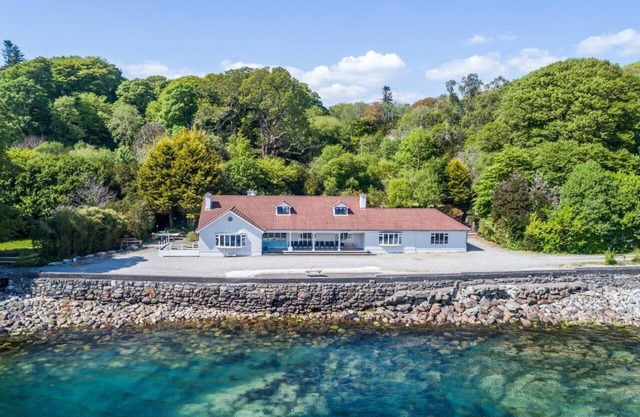 Private beachfront property set on 20 acres of exotic gardens