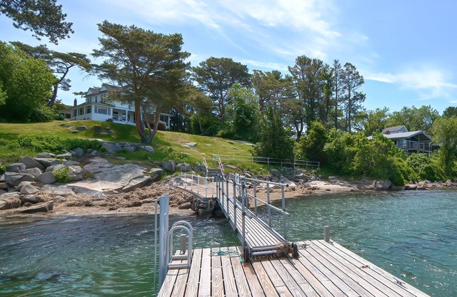 Private riverfront home with tidal dock, Annisquam Singing Pines