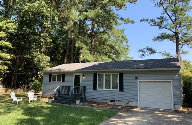Private single family home with a natural wooded setting providing much privacy.