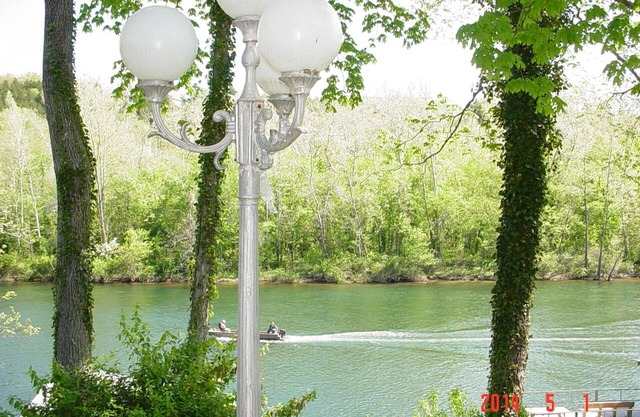 Private suite with a walk-out concrete patio on the lake with access to the dock