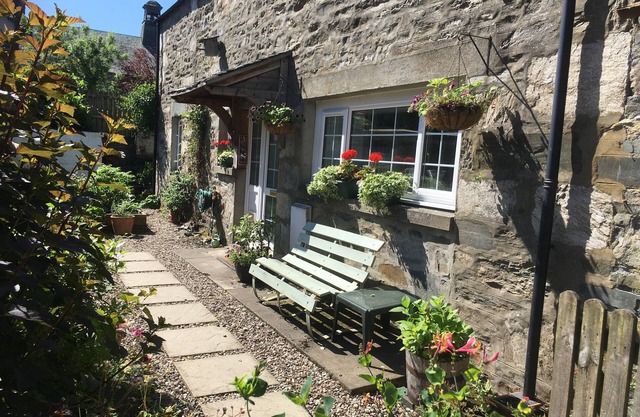 Quaint cottage in the heart of the village in the heart of Scotland.