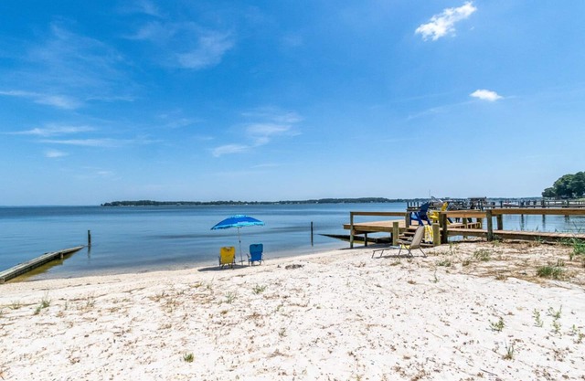 Quaint waterfront home with private beach