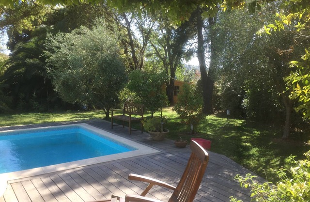 quiet charming little house with pool and sea walk in Porticcio center