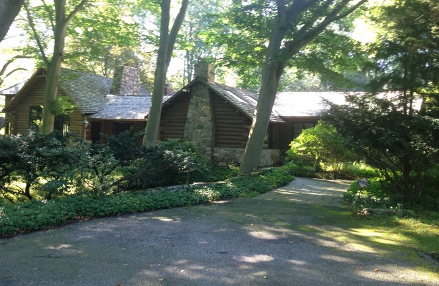 Real log house on Directly on the River with heated pool one hour from NYC.