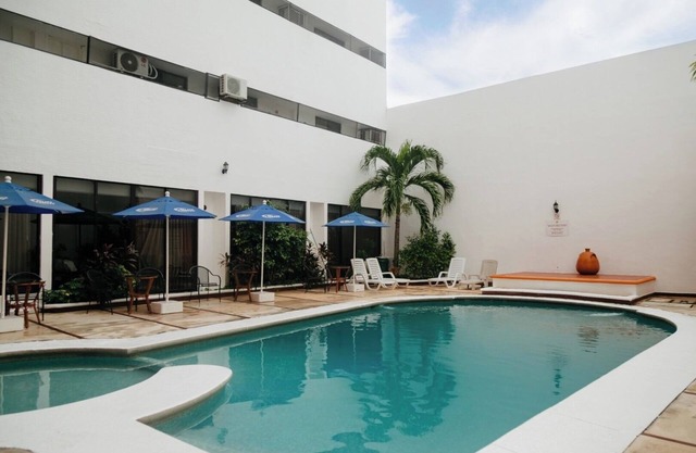 Relax at a Poolside Hotel in Mérida’s Centro District Near Dining & Local Market