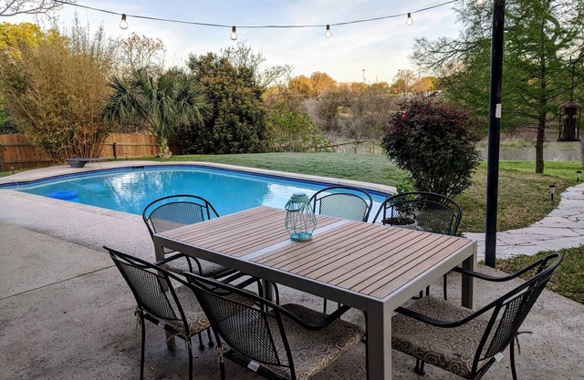 Relax Poolside at a Luxurious Creekfront Home in Round Rock