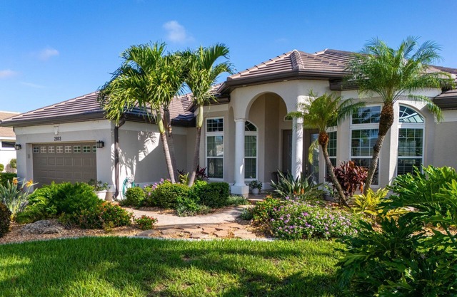 Relax & Unwind: Family Friendly Home with Private Heated Pool and Canal Views!