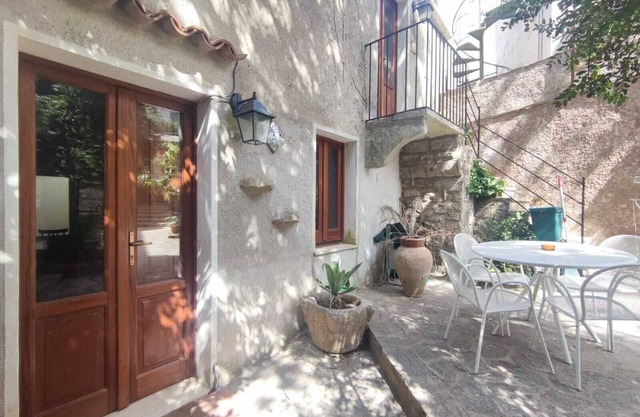 Relaxing in a typical Erice courtyard