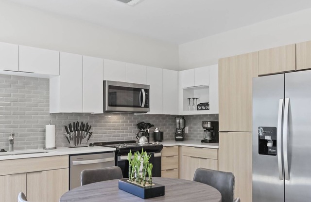 Reluxme | Modern 2BR Condo Near Uptown & Stadiums