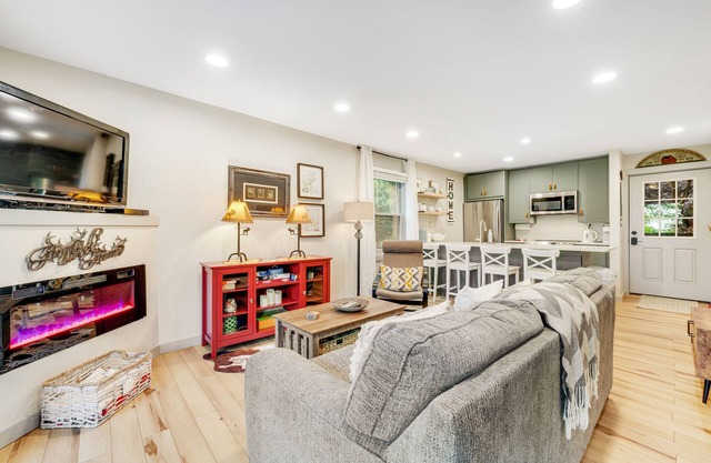 Remodeled, dog-friendly condo with balcony, fireplace, & W/D - walk to slopes