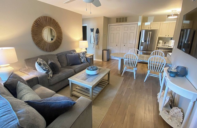 Renovated 1st Floor 2 Bedroom Condo close to pool and beach with outdoor space.
