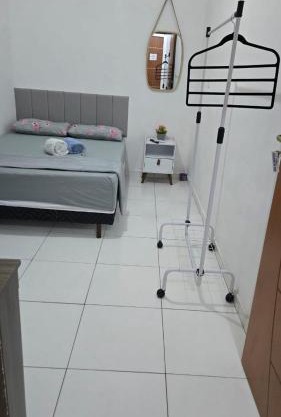 Residencial Lima - Quarto 06