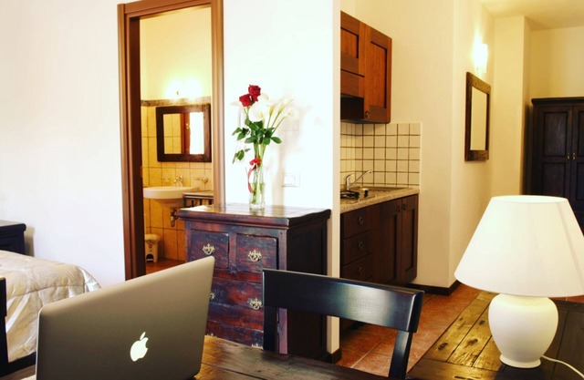 Residenza Locci Aparthotel & Rooms Studio Apartment with Terrace in the greenery in the center of Teulada.