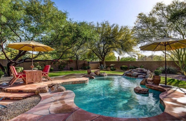 Resort like backyard w/Heated pool. Home Theater