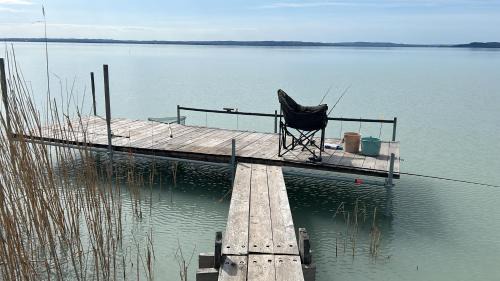 Retro Lakefront House With A Dock