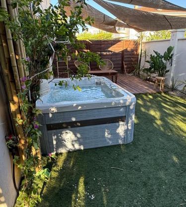 Rez de jardin cosy & jacuzzi