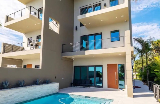 Riverview Retreat- Riverfront Paradise with Dock & Private Pool