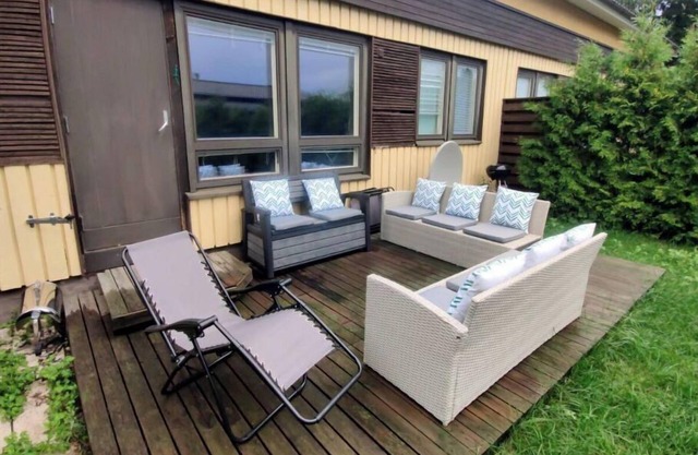 Row House with relaxing terrace in the garden
