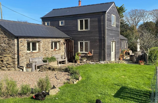Rustic cottage close to the coast with sea views. Dog friendly, large garden.