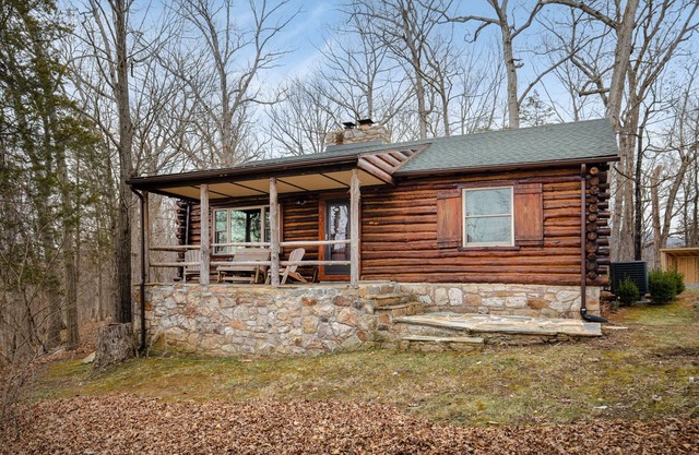 Rustic Mountain Log Cabin Perched on a cliff side above the Shenandoah River