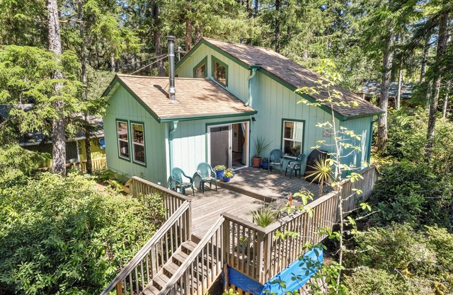 Sea Squirrel-MCA#1228-Perfect romantic beach retreat nestled in the trees.