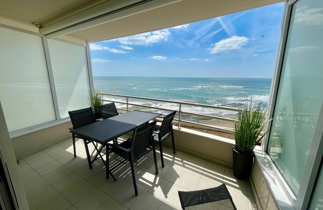Seafront T2 Apartment with Terrace, Garage, and Stunning Bay View