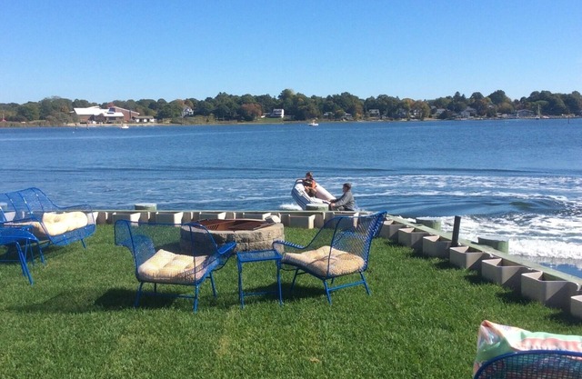 Seaside Getaway! Short walk to town and 180 degree water views.