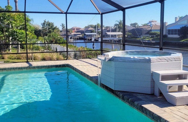 Seaside Oasis! Dog-Friendly, Waterfront, Private Dock, Saltwater Pool & Spa,