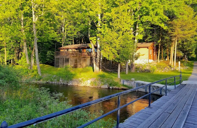 Secluded Cottage on the Boardman River w/Hot Tub & Fireplace