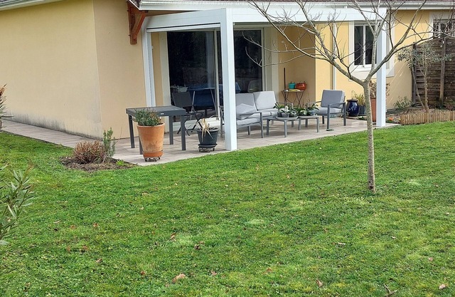 Semi-detached house in the countryside garden covered terrace