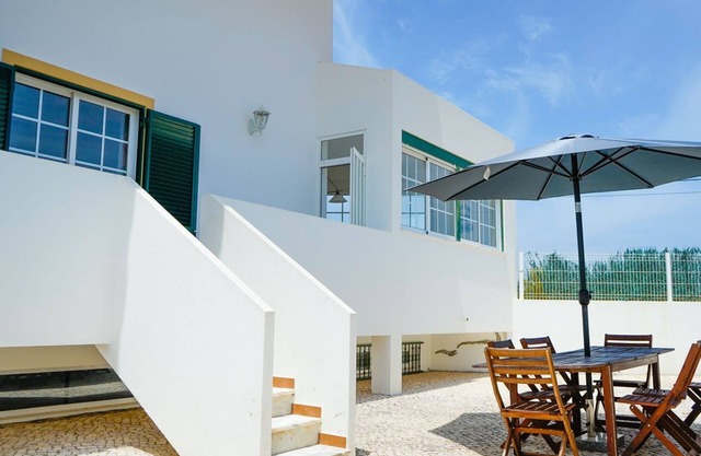 Serene Duplex House With Patio by LovelyStay