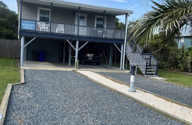 Short term rentals welcome. Steps to the beach. Pet friendly, fenced yard.
