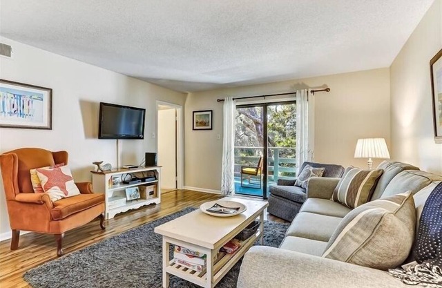 Short walk to beach. Open kitchen, dining room and living room spills out onto the private balcony
