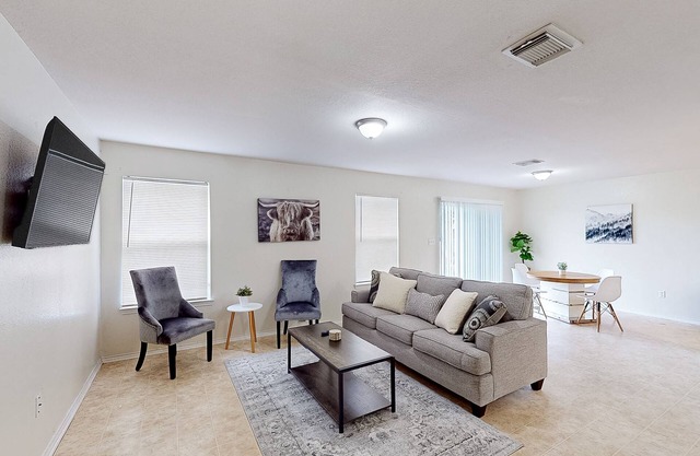 Single-story home with private yard, updated interior, AC, & W/D