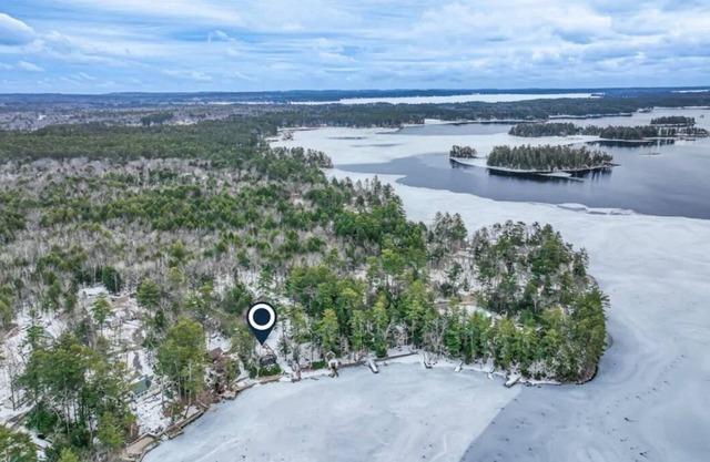 Sleeps 18! Large Waterfront Camp on Big Sebago with Two Docks & Sandy Beach