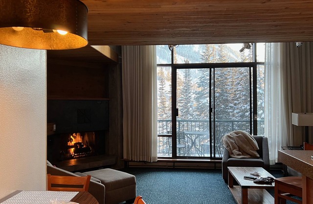 Snowbird slopeside two-story loft condo with stunning mountain views!