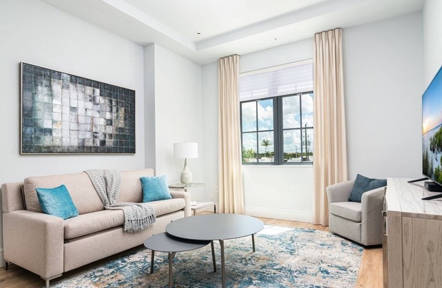 SOCE FLATS 207 - Brand New Olde Naples Condo Steps to 5th Ave S!